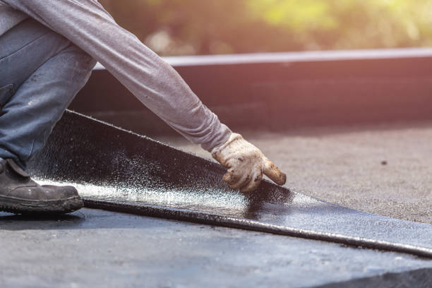 Professional Basement Waterproofing technician working in Wayland, NY